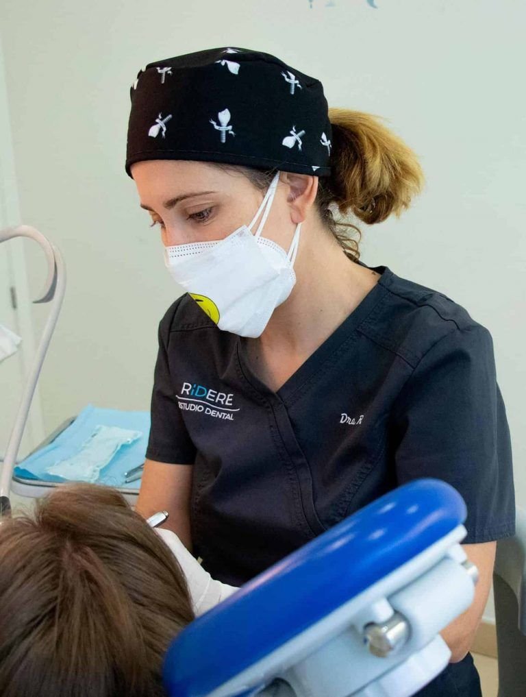 Dr. Marita Ruiz working with kids